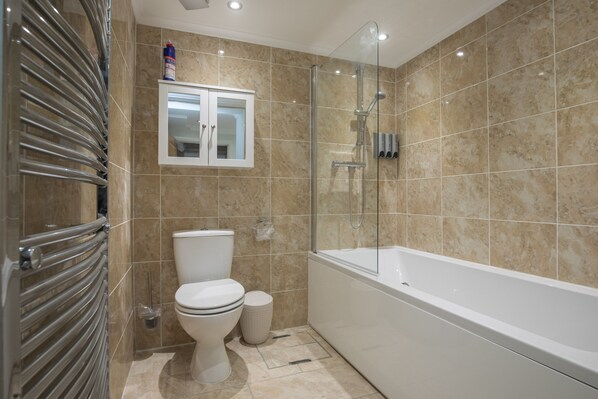 Hair dryer, towels, soap, shampoo