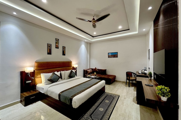 Family Triple Room | Down comforters, memory foam beds, minibar, desk