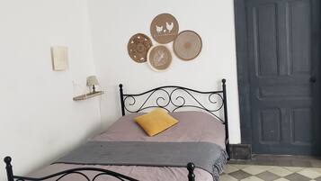 Iron/ironing board, travel cot, bed sheets