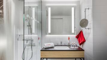 Shower, rainfall showerhead, hair dryer, towels
