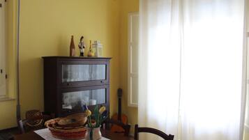 Basic Villa | Living area | 50-inch Smart TV with digital channels, TV, Netflix