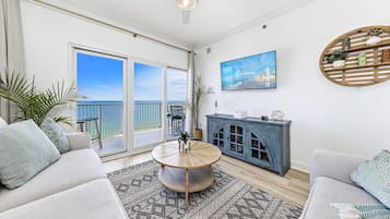 Signature Apartment, 3 Bedrooms, Balcony, Beach View | Living room | 60-inch Smart TV with cable channels, TV