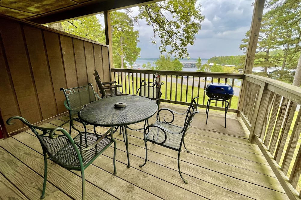 Lake View Queen Guest Room With Two Queens, Sleeper Sofa And Patio Overlooking Lake Ouachita. 1 Bedroom Hotel Room by Redawning