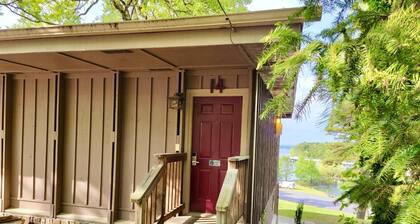 Lake View Queen Guest Room With Two Queens, Sleeper Sofa And Patio Overlooking Lake Ouachita. 1 Bedroom Hotel Room by RedAwning