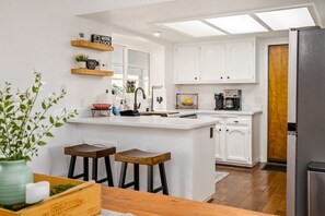 Fridge, microwave, dishwasher, coffee/tea maker