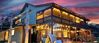 Lakefront, covered dock, hot tub, game/pool rm, 4wd trails, firepits, 22 people