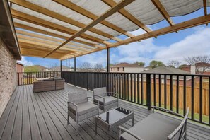 Terrace/patio - Elite 5BR/3.5B Home with Game Room, Hot Tub, & Sauna (Grand Prairie)