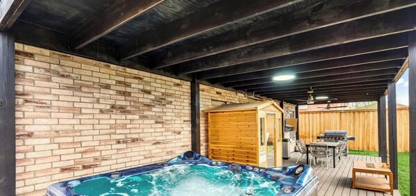 Terrace/patio - Elite 5BR/3.5B Home with Game Room, Hot Tub, & Sauna (Grand Prairie)