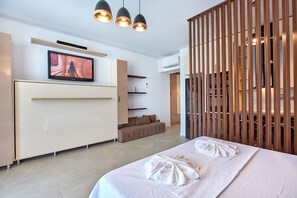 เอ็กซ์คลูซีฟสตูดิโอ | ห้องพักตกแต่งอย่างมีเอกลักษณ์, ตกแต่งพิเศษโดยเฉพาะ, เตารีด/โต๊ะรีดผ้า