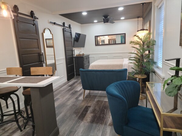 1 bedroom, desk, iron/ironing board, travel crib