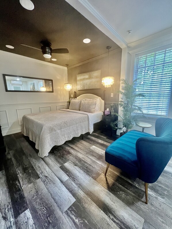 1 bedroom, desk, iron/ironing board, travel crib