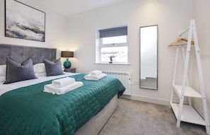 4 habitaciones, tabla de planchar con plancha, cuna de viaje y wifi
