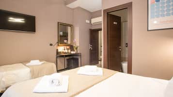 Triple Room | Down comforters, minibar, in-room safe, desk