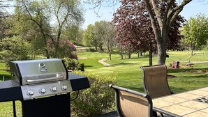 A grill on a deck with a view of a golf course. - Golf view! (Red Wing)