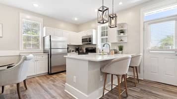 Microwave, stovetop, dishwasher, coffee/tea maker