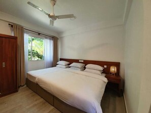 Deluxe Triple Room, 1 Bedroom, Non Smoking, Garden View