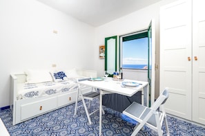 Panoramic House | 3 bedrooms, down comforters, in-room safe, iron/ironing board