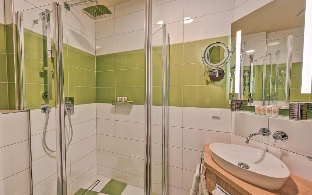 Bathroom | Shower, hair dryer, bathrobes, slippers