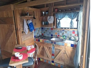 Fridge, coffee/tea maker, cookware/dishes/utensils, paper towels