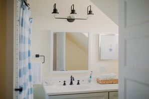 Hair dryer, towels, soap, shampoo