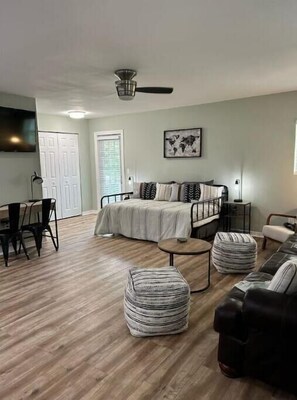 1 bedroom, desk, iron/ironing board, travel crib