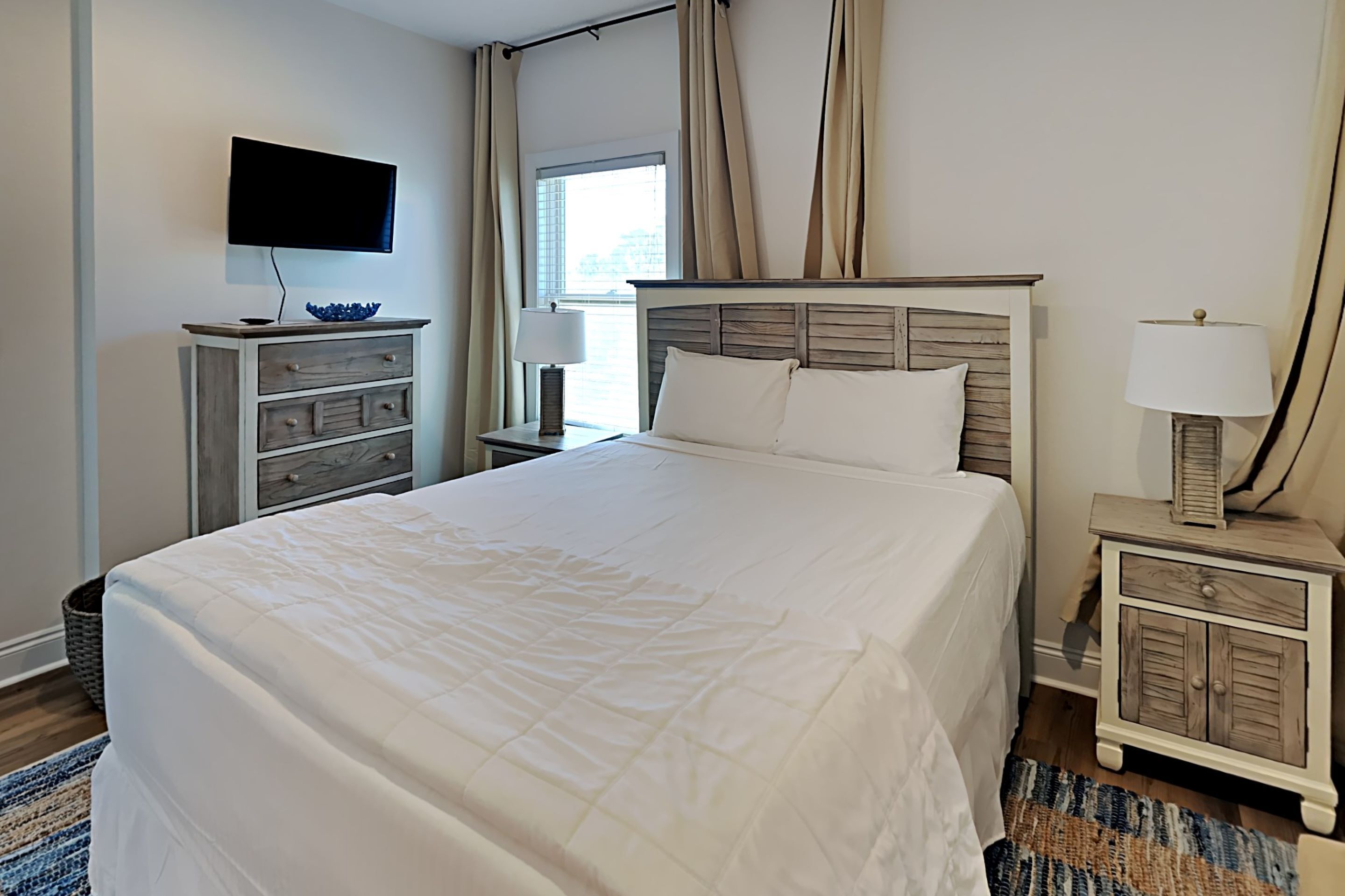 Condo, 1 Queen Bed, Balcony (#214E) | 1 bedroom, individually decorated, individually furnished, free WiFi