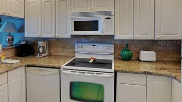Condo, Multiple Beds, Balcony, Ocean View | Private kitchen | Fridge, microwave, oven, stovetop