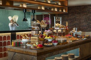 Daily buffet breakfast (INR 650 per person)