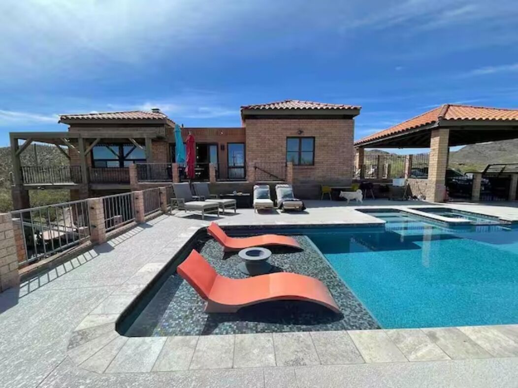 Home with lap pool, hot tub, and wonderful views