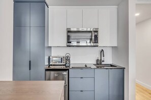 Fridge, microwave, coffee/tea maker, toaster