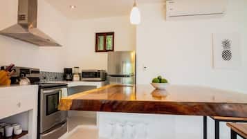 Fridge, stovetop, coffee/tea maker, cookware/dishes/utensils