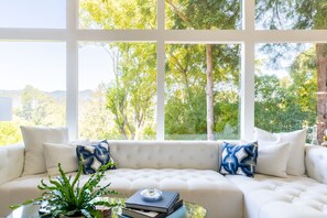 Smart TV, fireplace, books, printers