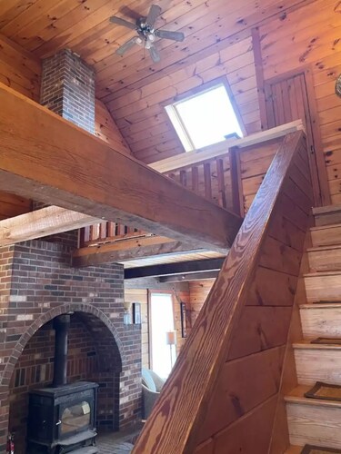 Hill top home located on 30 acres with privacy and surrounding natural beauty.