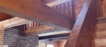 Hill top home located on 30 acres with privacy and surrounding natural beauty.