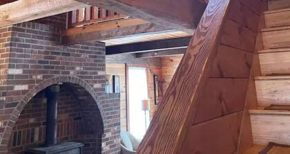 Hill top home located on 30 acres with privacy and surrounding natural beauty.