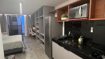 Apartment | Private kitchen | Mini-fridge, microwave, stovetop, coffee/tea maker