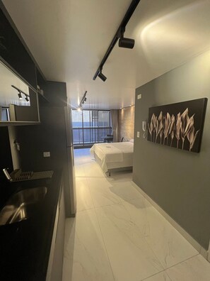 Apartamento superior | 1 quarto, individualmente decorados, individualmente mobiliados