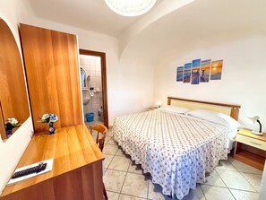 Quarto standard | Wi-Fi de cortesia, roupa de cama