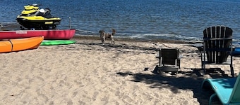 Waterview Trailer on Georgian Bay w/ kayaks and paddleboard and sandy beach