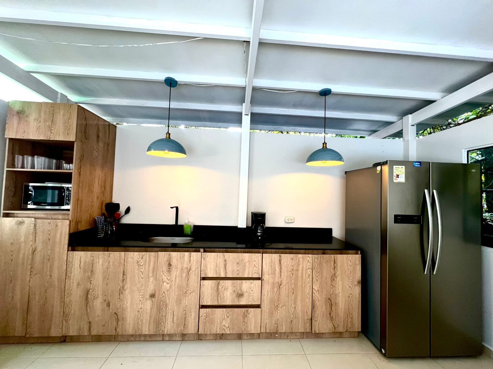 Villa | Private kitchen | Full-sized fridge, microwave, coffee/tea maker, blender