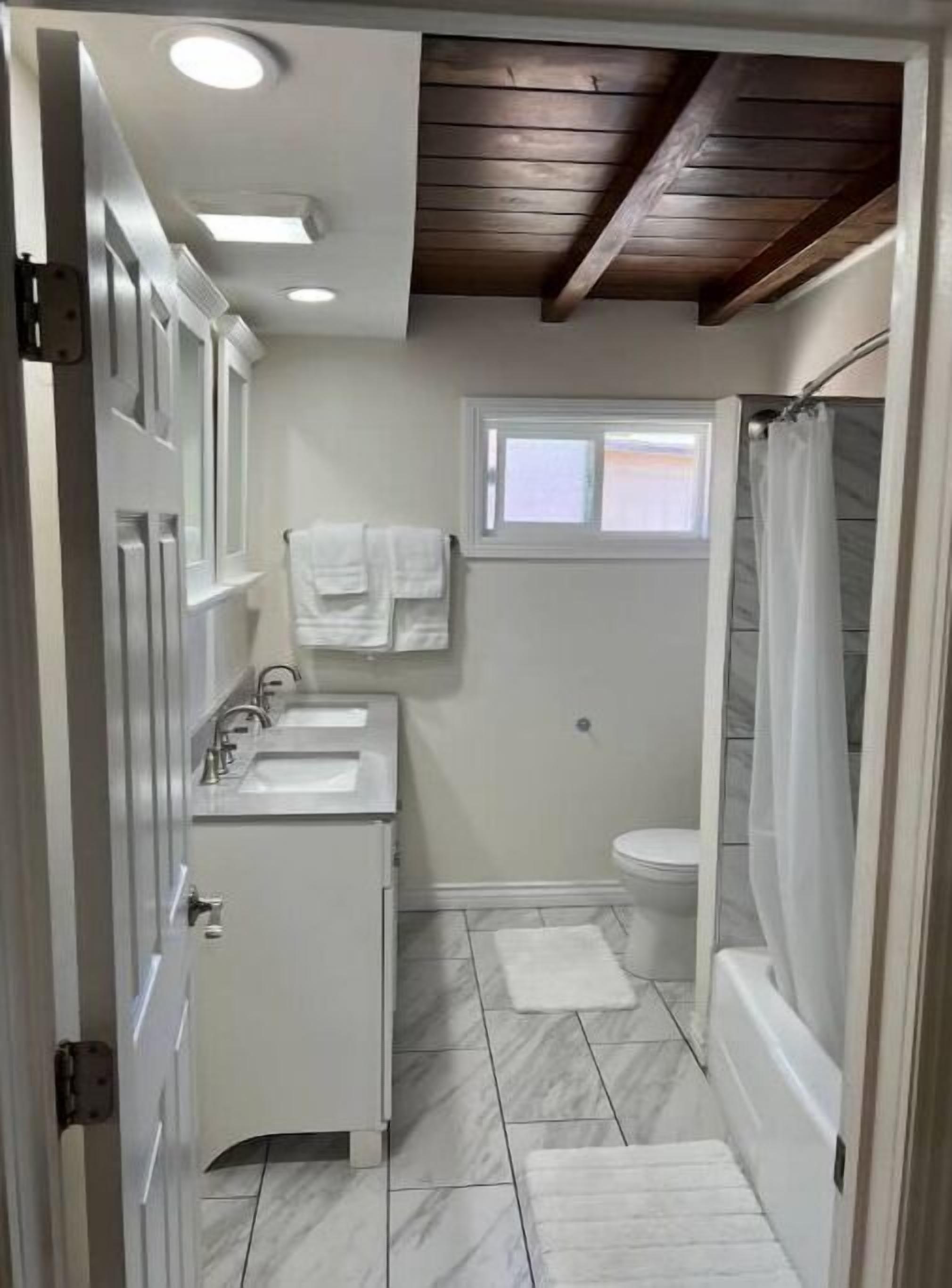 Jetted tub, hair dryer, towels, soap