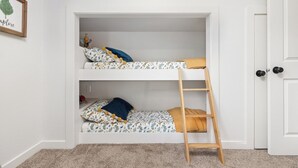 A bunk bed with a ladder, white walls, and a door. - The Big Dipper between Kaweah River & Skyline, SNP (Three Rivers)