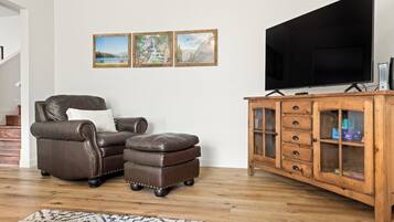 TV, fireplace, books, offices