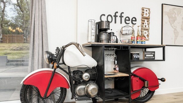A vintage red and white motorcycle with a coffee machine and bar setup in the background. - The Big Dipper between Kaweah River & Skyline, SNP (Three Rivers)