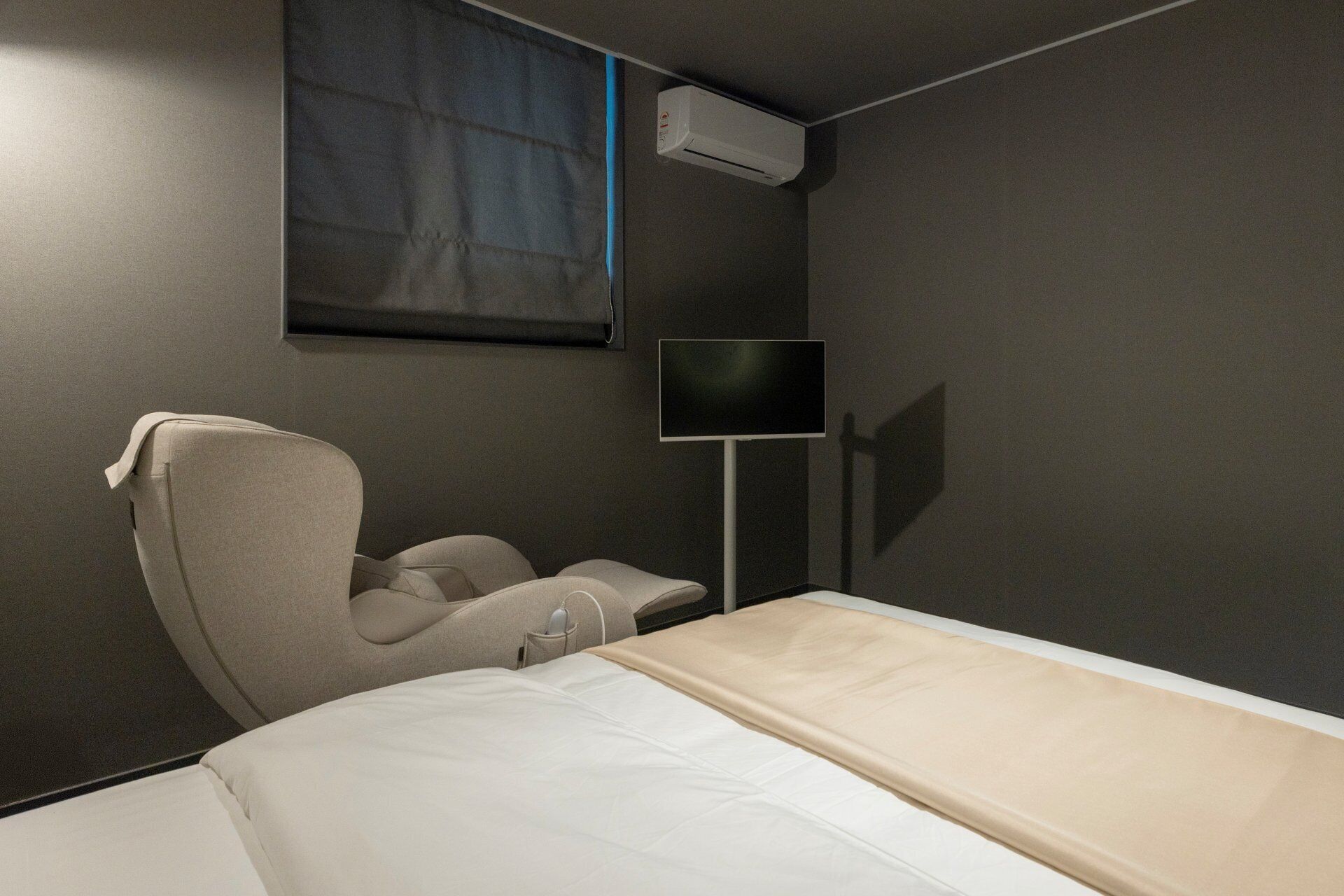 Massage Chair Room | Down comforters, desk, laptop workspace, free WiFi