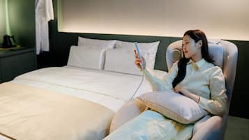 Massage Chair Room | Down comforters, desk, laptop workspace, free WiFi