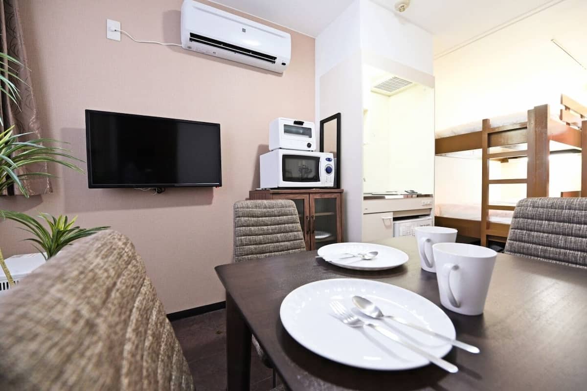 Superior Room | Living area | Flat-screen TV