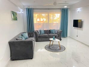 Departamento Deluxe | Área de sala de estar