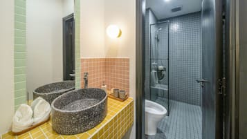 Shower, free toiletries, hair dryer, slippers