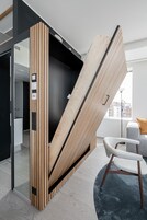 Deluxe Apartment | Living area | 39-inch flat-screen TV with cable channels, TV